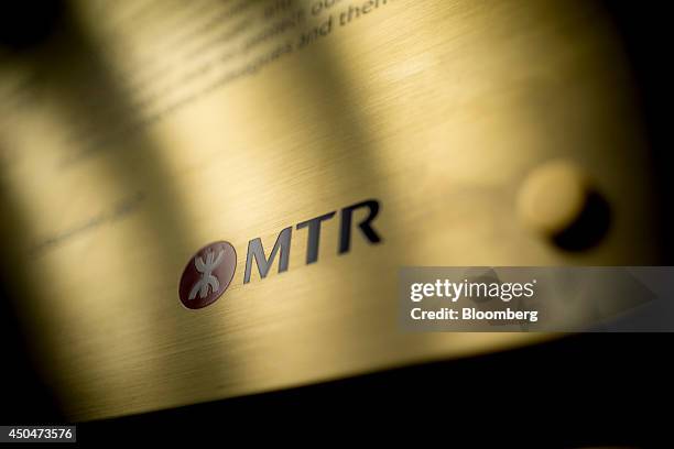 The MTR Corp. Logo is displayed on a sign inside the company's operations control center at Tsing Yi station in Hong Kong, China, on Thursday, June...