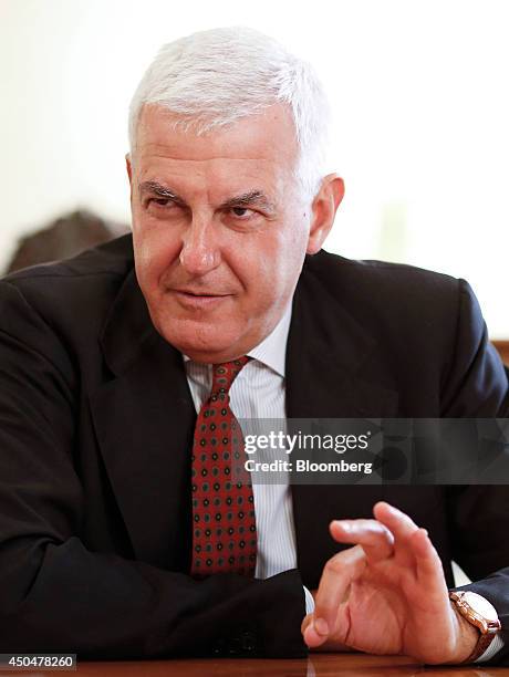 Alessandro Profumo, chairman of Banca Monte dei Paschi di Siena SpA, gestures during an interview inside his office at the headquarters of Banca...