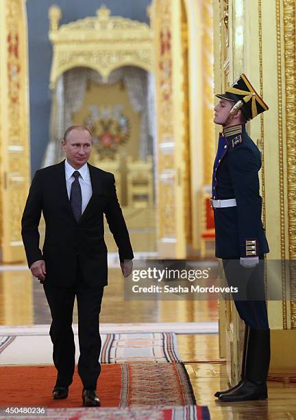 Russian President Vladimir Putin arrives to the State Awards Ceremony during celebration of the Day of Russia at the Grand Kremlin Palace on June 12,...