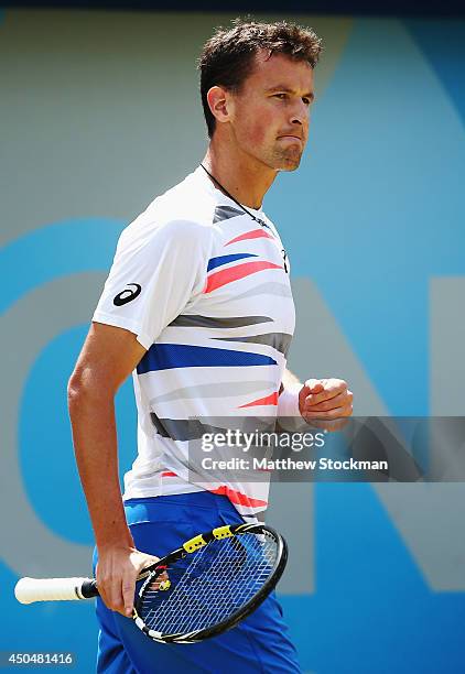 Kenny De Schepper of France in action against Feliciano Lopez of Spain during their Men's Singles match on day four of the Aegon Championships at...