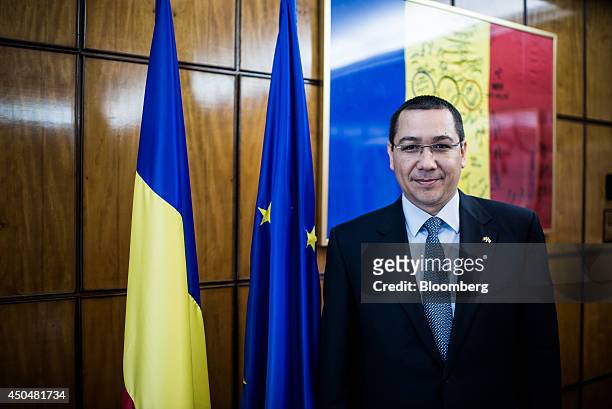 Victor Ponta, Romania's prime minister, poses for a photograph at the Victoria Palace in Bucharest, Romania, on Thursday, June 12, 2014. Romania is...
