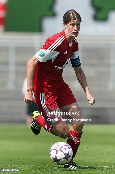 Kerstin Garefrekes of Frankfurt runs with the ball during the Women's Bundesliga match between VfL Wolfsburg and 1. FFC Frankfurt at Stadion am...