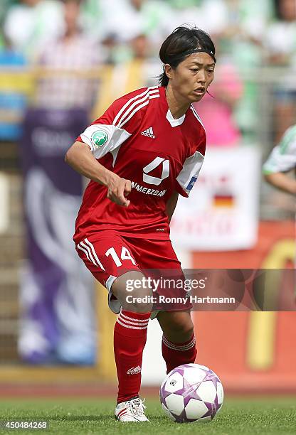 Kozue Ando of Frankfurt runs with the ball during the Women's Bundesliga match between VfL Wolfsburg and 1. FFC Frankfurt at Stadion am Elsterweg on...