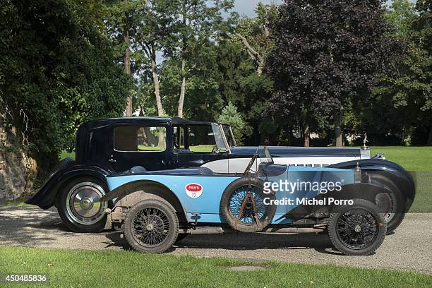 Bugatti type Brescia car stands beside the most exclusive and most expensive Bugatti Royale at Chateau Saint Jean, the head office of Bugatti, during...