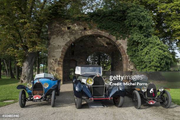Bugatti type Brescia cars stand beside the most exclusive and most expensive Bugatti Royale at Chateau Saint Jean, the head office of Bugatti, during...