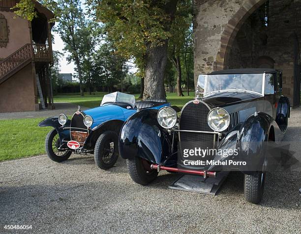 Bugatti type Brescia car stands beside the most exclusive and most expensive Bugatti Royale at Chateau Saint Jean, the head office of Bugatti, during...