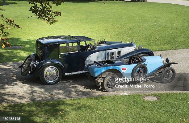 Bugatti type Brescia car is dwarfed by the most exclusive and expensive Bugatti Royale at Chateau Saint Jean, the head office of Bugatti, during a...