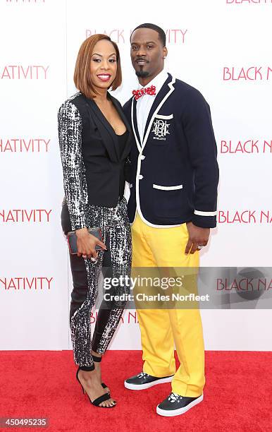 Olympic Gold Medalist Sanya Richards-Ross and husband Aaron Ross attend the "Black Nativity" premiere at The Apollo Theater on November 18, 2013 in...