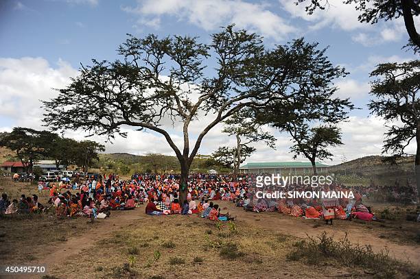 Kenyan Maasai women gather during a meeting dedicated to the practice of female genital mutilation in which several participants voiced opposition to...