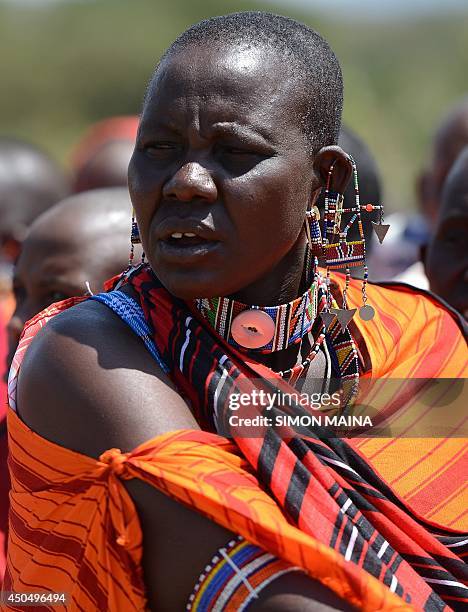 Kenyan Maasai woman takes part in a gathering and meeting dedicated to the practice of female genital mutilation in which several participants voiced...