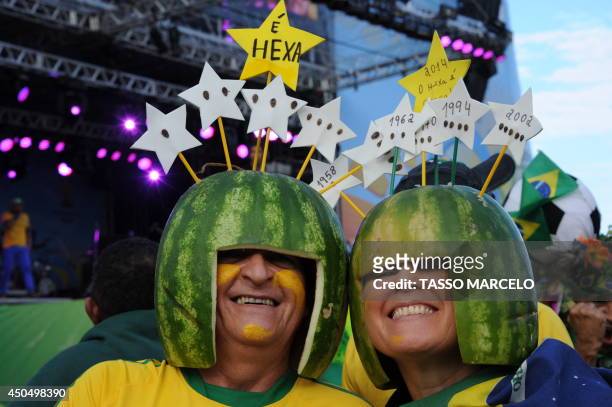 Supporters of different countries gather at the Fan Fest in Rio de Janeiro on June 12, 2014. Brazil was nervously gearing up for the start of the...