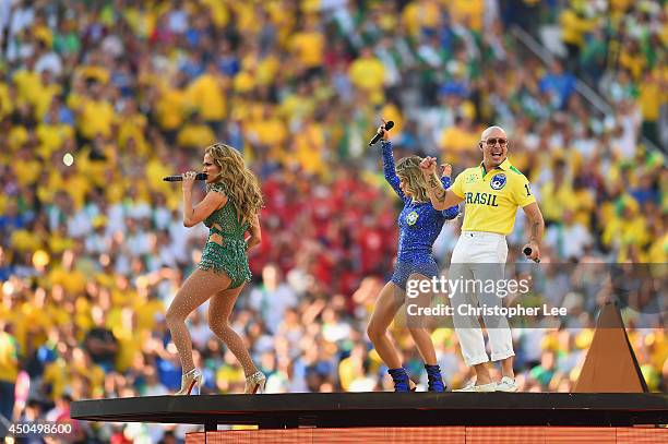 Perfomers Jennifer Lopez, Claudia Leitte and Pitbull perform during the Opening Ceremony of the 2014 FIFA World Cup Brazil prior to the Group A match...