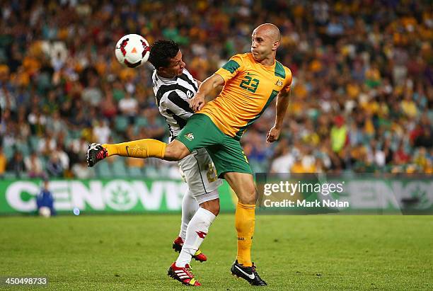 Mark Bresciano of Australia and Jose Cubero of Costa Rica contest possession during the international friendly match between the Australian Socceroos...