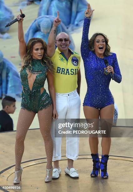 Rapper Pitbull Brazilian pop singer Claudia Leitte and US singer Jennifer Lopez gesture as they part in the opening ceremony of the 2014 FIFA World...