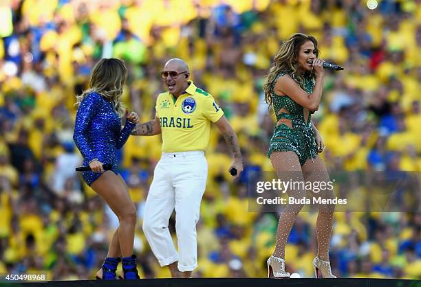 Singers Claudia Leitte, Jennifer Lopez and Pitbull perform during the Opening Ceremony of the 2014 FIFA World Cup Brazil prior to the Group A match...