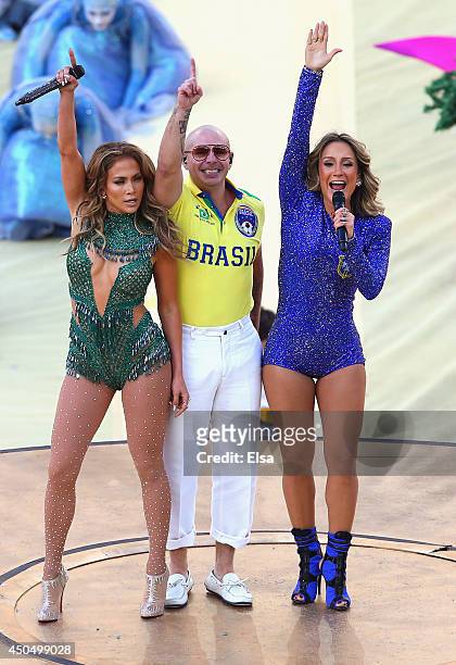 Singers Jennifer Lopez, Pitbull and Claudia Leitte perform during the Opening Ceremony of the 2014 FIFA World Cup Brazil prior to the Group A match...