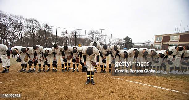 Members of the Tennoji High School baseball team from Osaka, Japan played an exhibition game against defending state champions Hingham High School at...