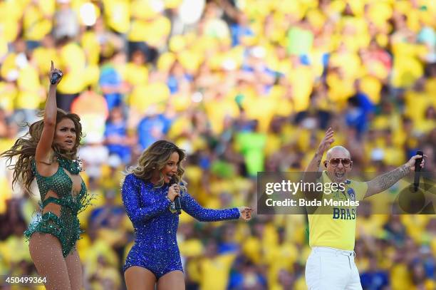 Singers Jennifer Lopez, Claudia Leitte and Pitbull perform during the Opening Ceremony of the 2014 FIFA World Cup Brazil prior to the Group A match...