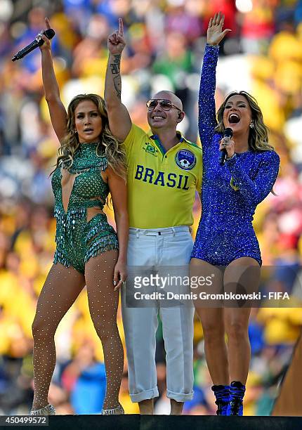 Singer Jennifer Lopez, rapper Pitbull and singer Claudia Leitte perform during the 2014 FIFA World Cup Brazil Opening Ceremony at Arena de Sao Paulo...