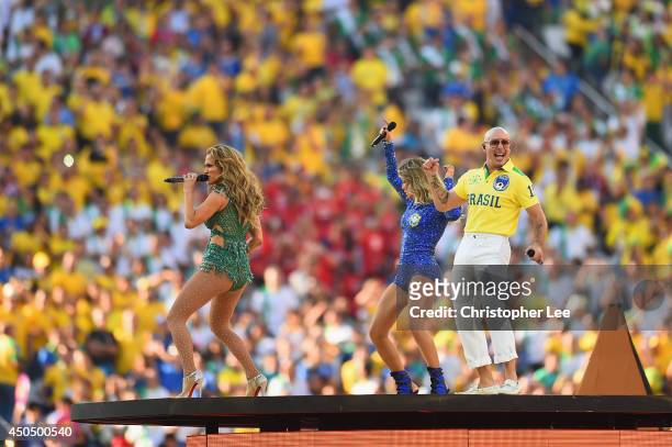 Perfomers Jennifer Lopez, Claudia Leitte and Pitbull perform during the Opening Ceremony of the 2014 FIFA World Cup Brazil prior to the Group A match...