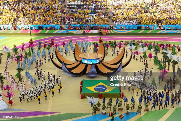 General view as singers Jennifer Lopez, Pitbull and Claudia Leitte perform during the Opening Ceremony of the 2014 FIFA World Cup Brazil prior to the...