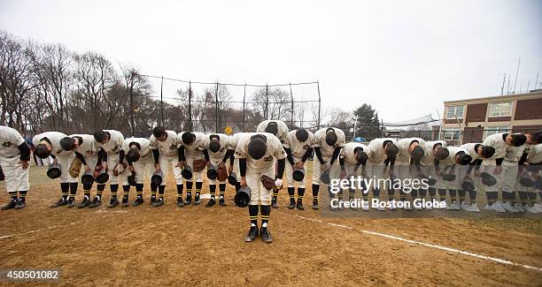 Members of the Tennoji High School baseball team from Osaka, Japan played an exhibition game against defending state champions Hingham High School at...