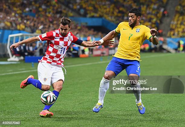 Darijo Srna of Croatia controls the ball against Hulk of Brazil during the 2014 FIFA World Cup Brazil Group A match between Brazil and Croatia at...