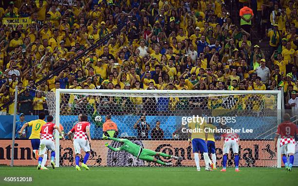 Neymar of Brazil takes a penalty kick against Stipe Pletikosa of Croatia during the 2014 FIFA World Cup Brazil Group A match between Brazil and...