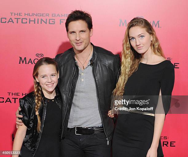 Actor Peter Facinelli and daughters Luca Bella Facinelli and Lola Ray Facinelli arrive at the Los Angeles Premiere "The Hunger Games: Catching Fire"...