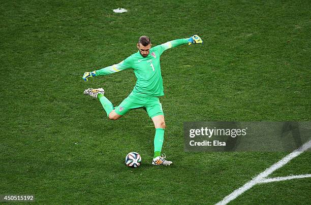 Stipe Pletikosa of Croatia kicks the ball during the 2014 FIFA World Cup Brazil Group A match between Brazil and Croatia at Arena de Sao Paulo on...