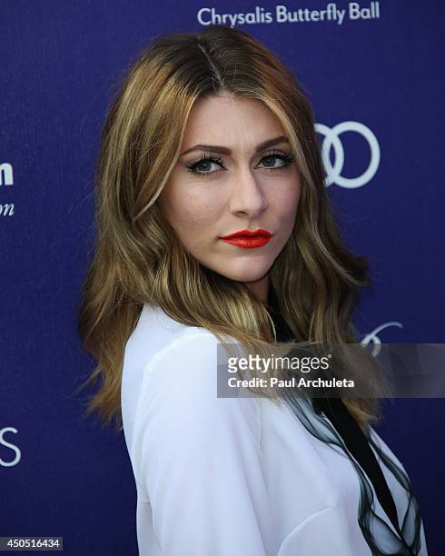 Singer Amy Heidemann attends the 13th Annual Chrysalis Butterfly Ball at a private Mandeville Canyon Estate on June 7, 2014 in Los Angeles,...