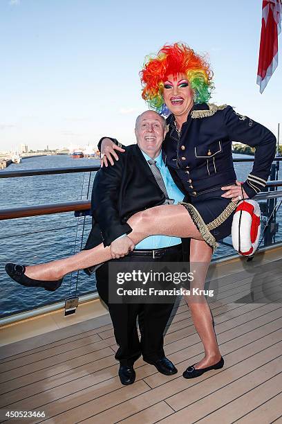 Reiner Calmund and Olivia Jones attend the christening of the ship 'Mein Schiff 3' on June 12, 2014 in Hamburg, Germany.