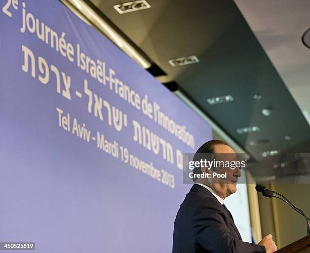 French President Francois Hollande gives a speech during their visit to a French-Israeli technology innovation summit at a hotel on November 19, 2013...