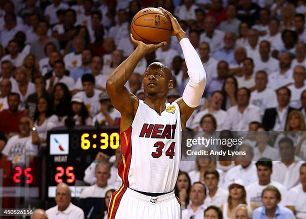 Ray Allen of the Miami Heat takes a shot against the San Antonio Spurs during Game Four of the 2014 NBA Finals at American Airlines Arena on June 12,...