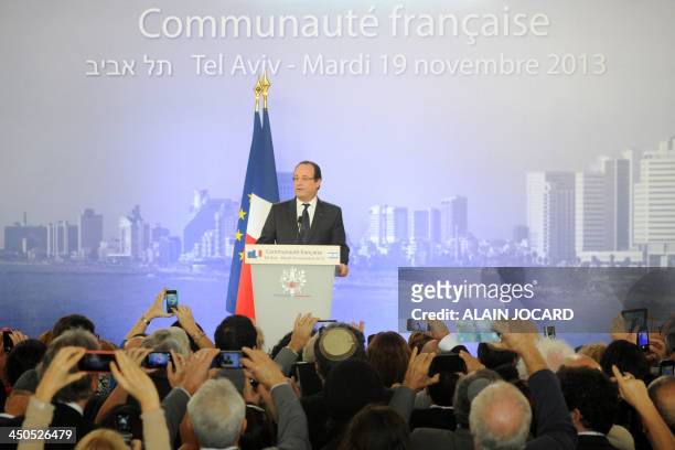 French President Francois Hollande delivers a speech to the French comunity, in Tel Aviv on November 19, 2013. Hollande wrapped up a three-day trip...