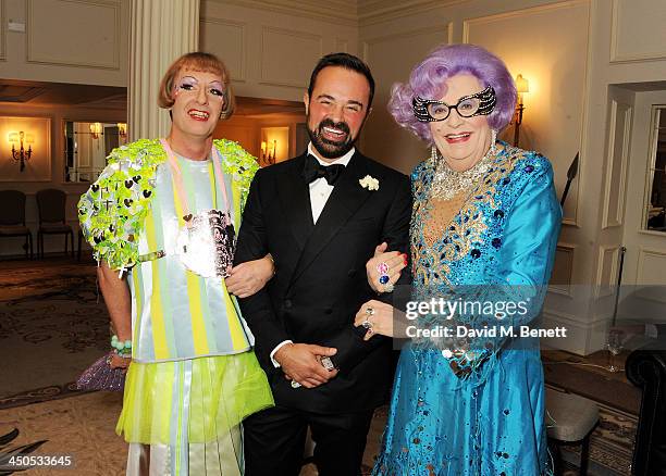 Grayson Perry, Owner of the London Evening Standard Evgeny Lebedev and Dame Edna Everage attend a drinks reception at the 59th London Evening...