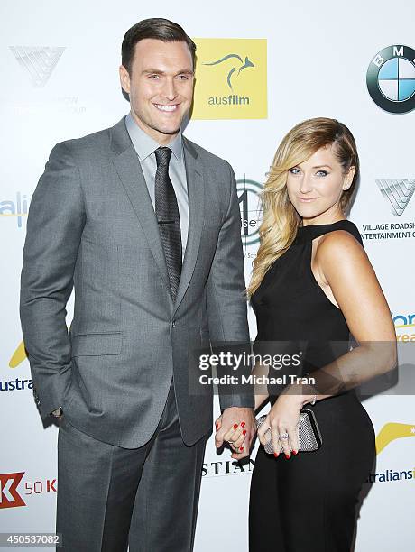 Owain Yeoman and wife, Gigi Yallouz arrive at Australians In Film's 6th Annual Heath Ledger Scholarship dinner held at SLS Hotel at Beverly Hills on...