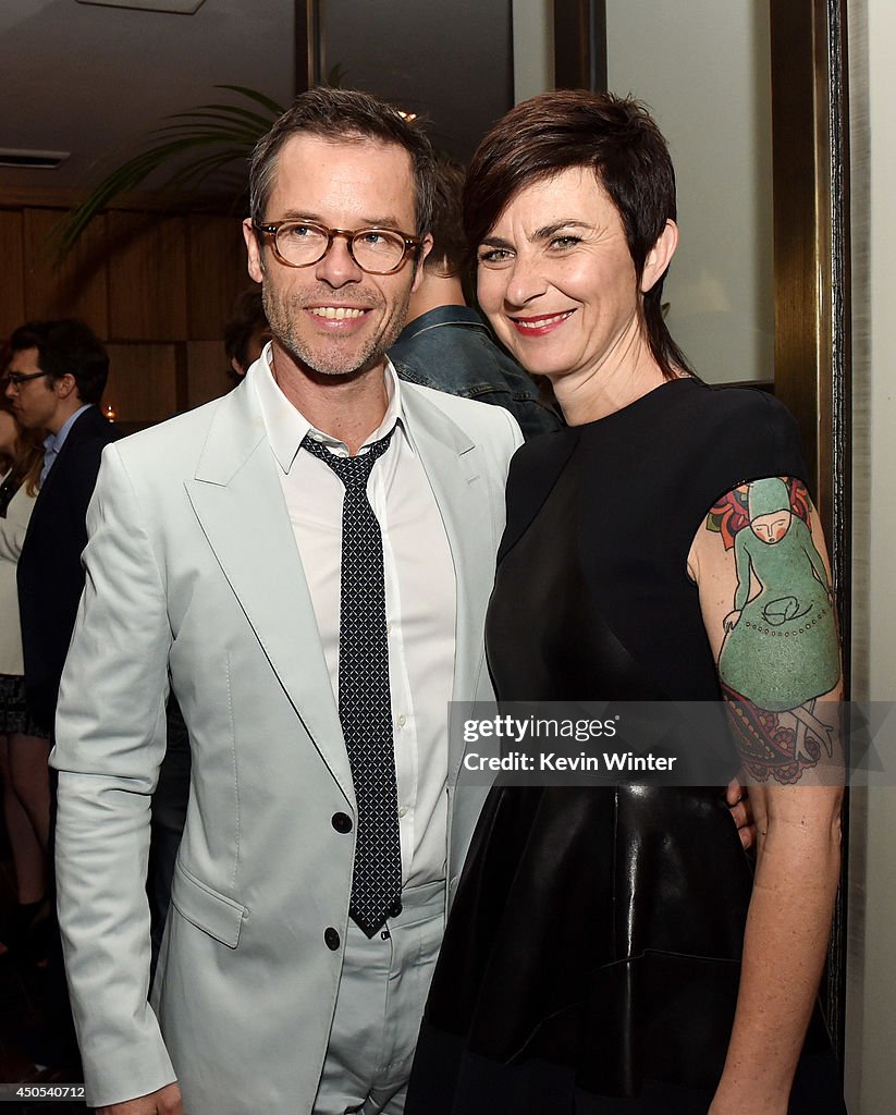 Actor Guy Pearce and his wife Kate Mestitz pose at the after party