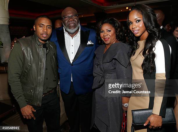 Rapper Nas, Executive producer Bishop TD Jakes, Serita Jakes and Sarah Jakes attend the after party for the "Black Nativity" premiere at The Red...
