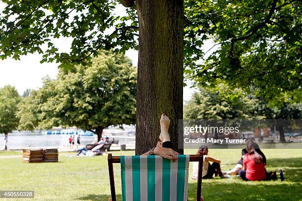 Madelyn Freeman relaxes in a deckchair in the sunshine in Hyde Park as forecasters predict that it will be the hottest day of the year, on June 13,...