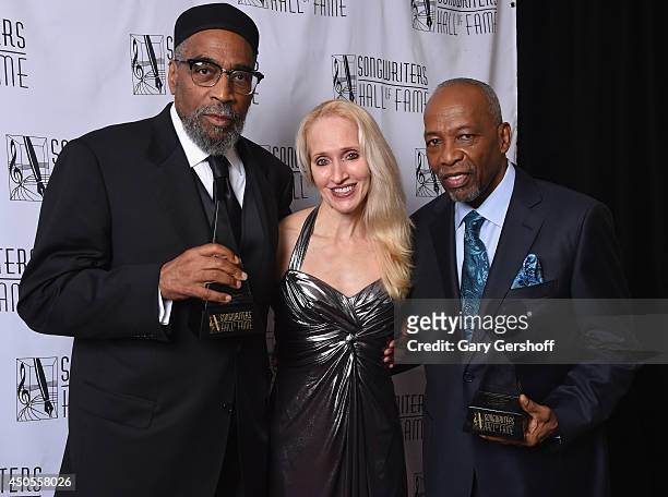 Honorees Leon Huff and Kenneth Gamblepose with April Anderson at the Songwriters Hall of Fame 45th Annual Induction and Awards at Marriott Marquis...