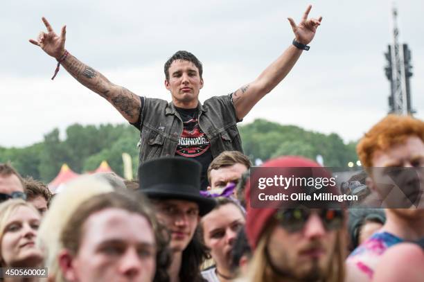The crowd watch on as Black Label Society performs on the main stage at Download Festival at Donnington Park on June 13, 2014 in Donnington, United...