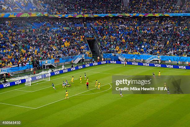 Oribe Peralta of Mexico scores a goal during the 2014 FIFA World Cup Brazil Group A match between Mexico and Cameroon at Estadio das Dunas on June...