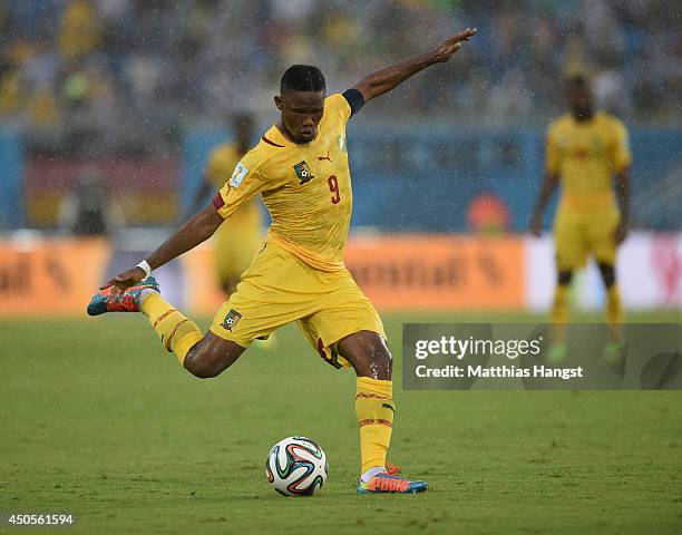 Samuel Eto'o of Cameroon kicks the ball during the 2014 FIFA World Cup Brazil Group A match between Mexico and Cameroon at Estadio das Dunas on June...
