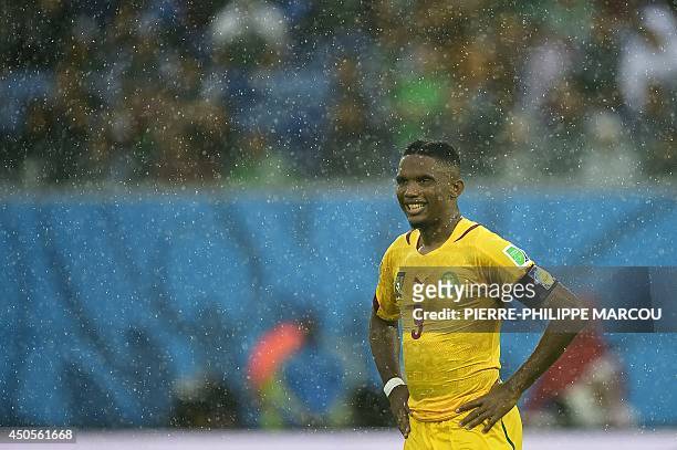 Cameroon's forward and captain Samuel Eto'o smiles during a Group A football match between Mexico and Cameroon at the Dunas Arena in Natal during the...