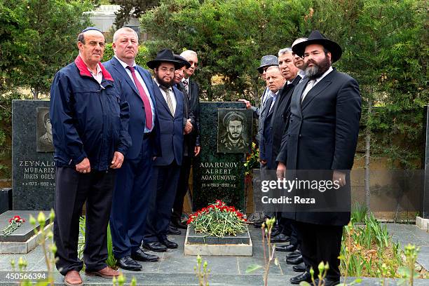 May 9 Martyrs Lane, Baku, Azerbaijan. A group of Jewish representatives gather at the grave of the national hero, Albert Agarunov, to commemorate the...