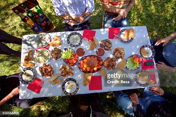 May 6 Gakh , Azerbaijan. An Azerbaijani, Christian family celebrates Saint Georges day with their Muslim neighbors. Saint George is respected by...