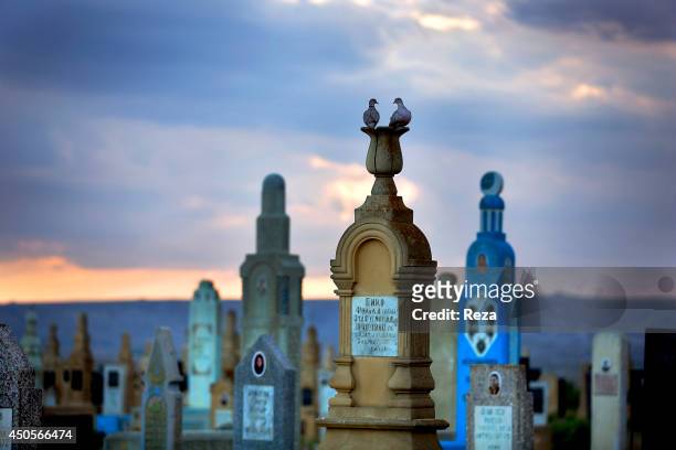 August 10 Sofi Hamid Cemetery, South of Baku, Azerbaijan. The pastel-colored tombstones at the Sofi Hamid Cemetery are from diverse time periods. The...