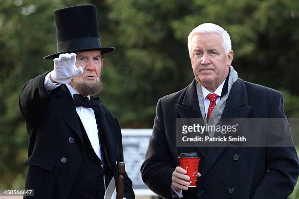 Portraying U.S. President Abraham Lincoln, James Getty , speaks to Pennsylvania Governor Tom Corbett during a commemoration of the 150th Anniversary...