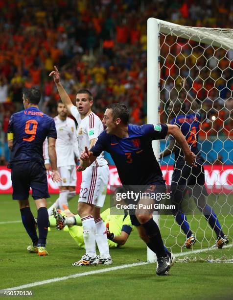 Stefan de Vrij of the Netherlands celebrates after scoring the team's third goal during the 2014 FIFA World Cup Brazil Group B match between Spain...